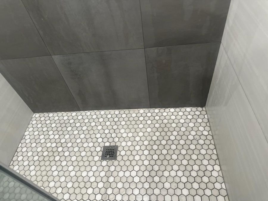 A clean tiled shower floor